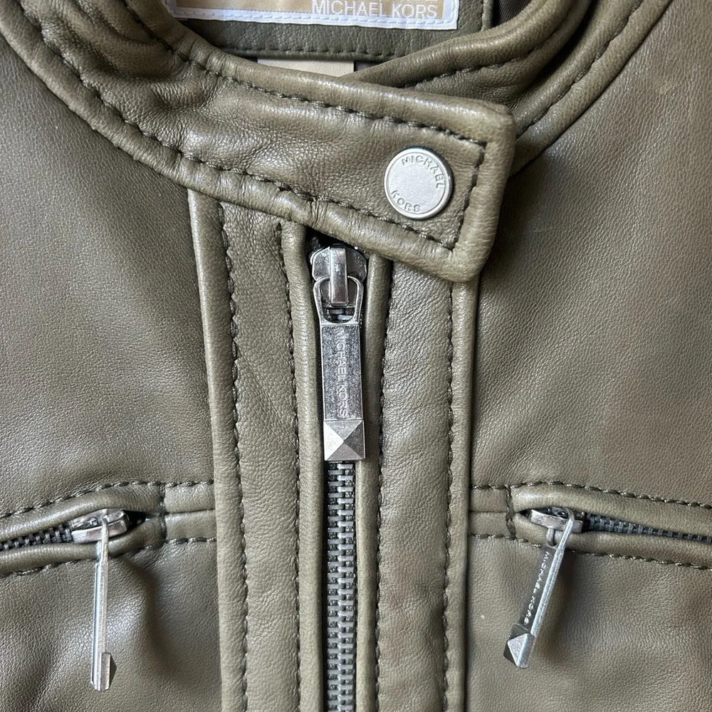 NWOT Michael Kors Med ladies green leather lined jacket.